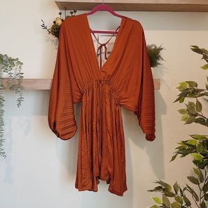Rust colored dress by Peach Love.